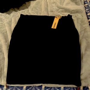 Stretchy skirt with zippers down each side.